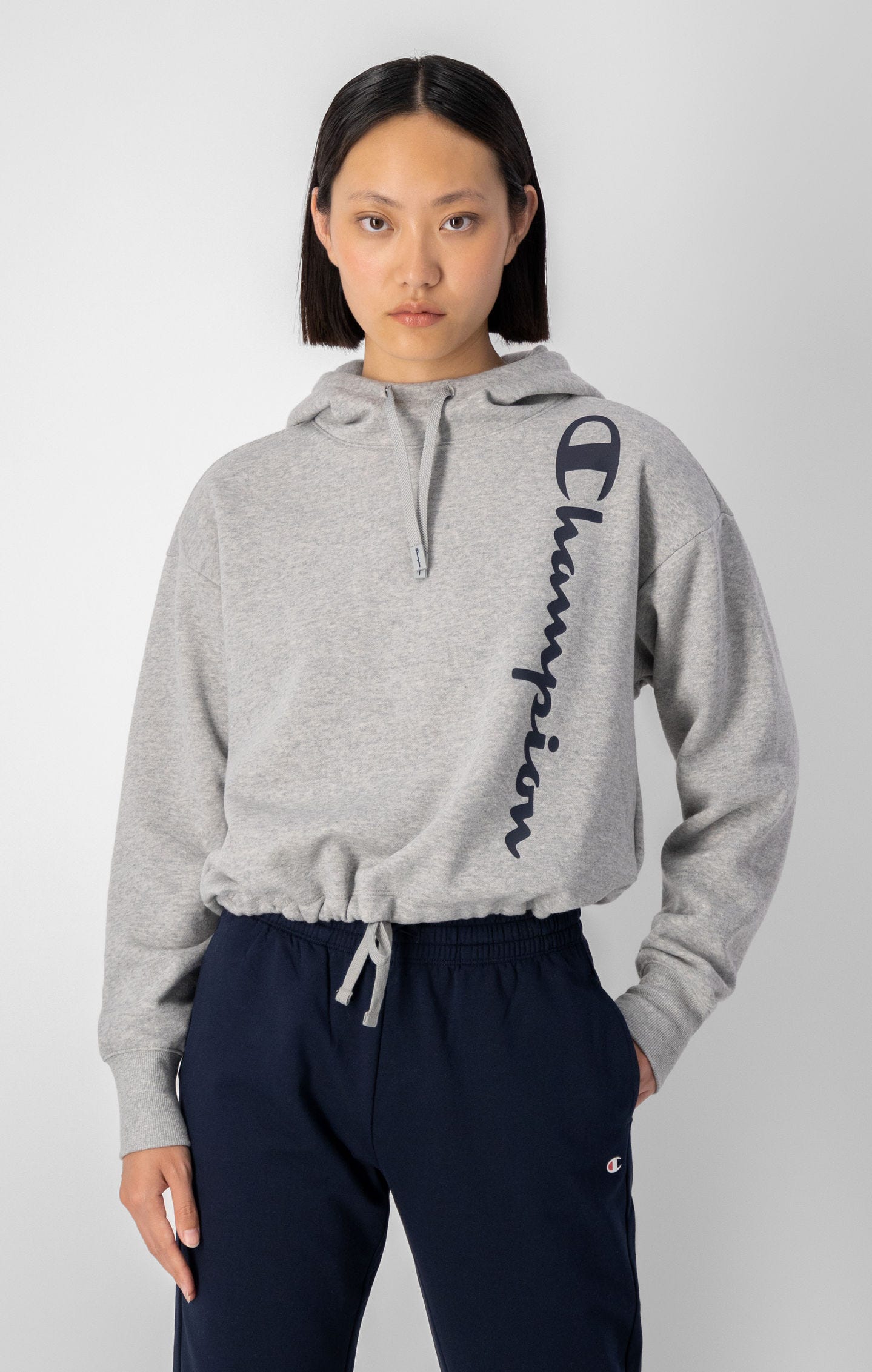 Sweatshirt à capuche et logo Champion vertical